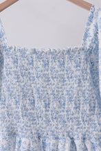 Navy smocked floral puff sleeve dress