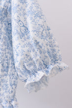 Navy smocked floral puff sleeve dress