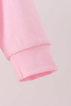 Pink football bow sequin bubble
