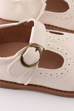 White vintage leather shoes