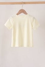 Beige character french knot top