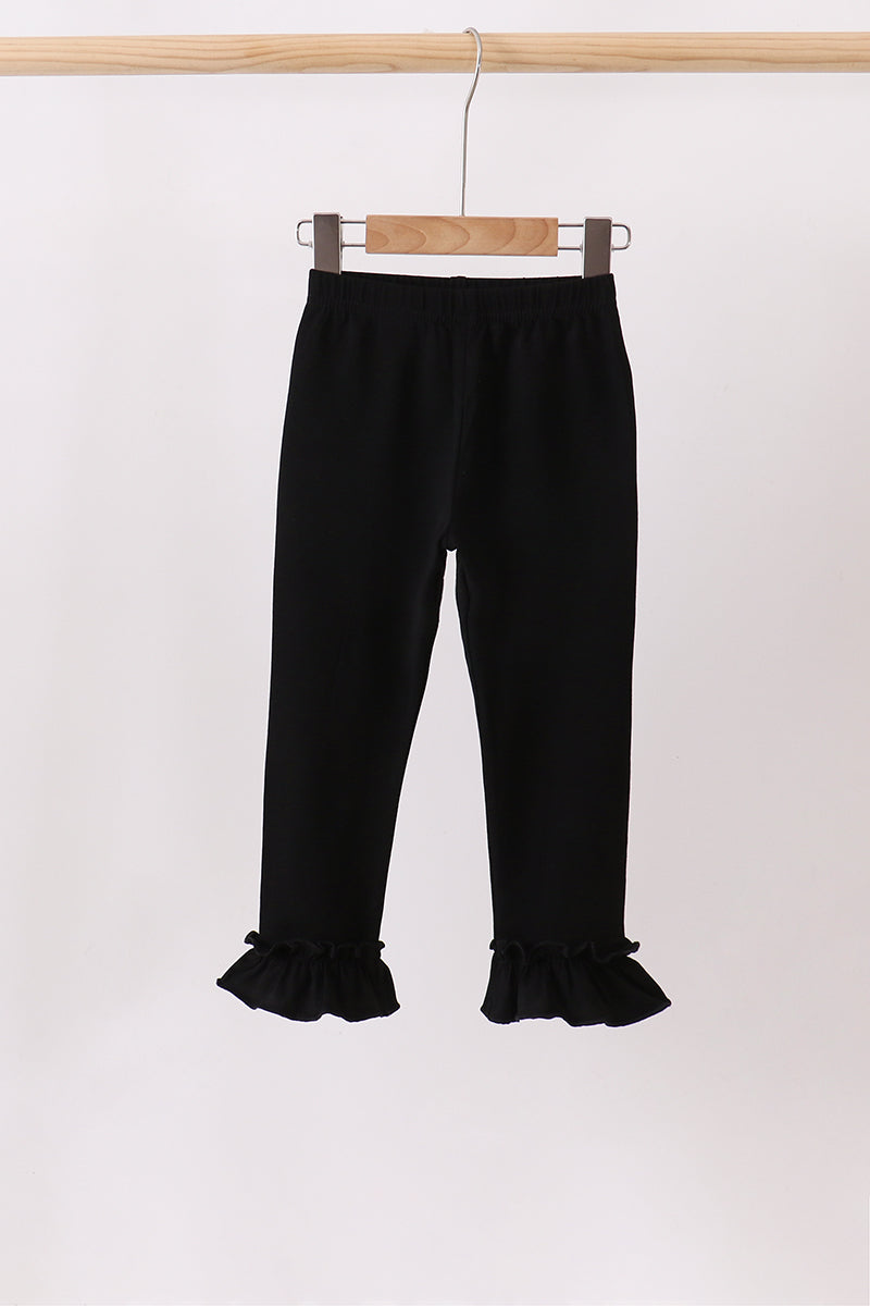 Black ruffle pants