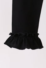 Black ruffle pants