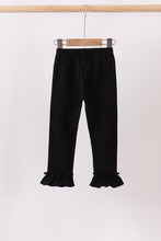 Black ruffle pants