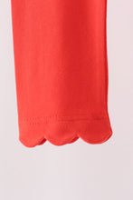 Red scalloped leggings