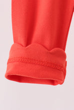 Red scalloped leggings