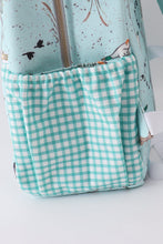 Green duck print backpack