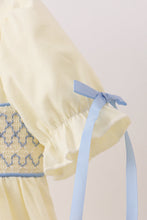 Cream smocked ruffle dress