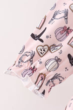 Pink Spooky print ruffle dress