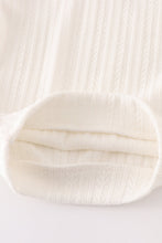 White pullover sweater