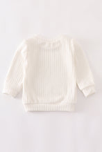 White pullover sweater
