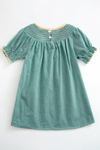 Green pumpkin smocked dress