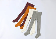 Rust ribbed knit tights