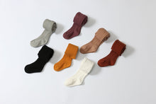 Rust ribbed knit tights